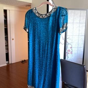 Evening dress with silver beads beautifully zipper in the back backless V shape